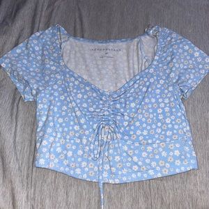 Baby blue crop top with flower print